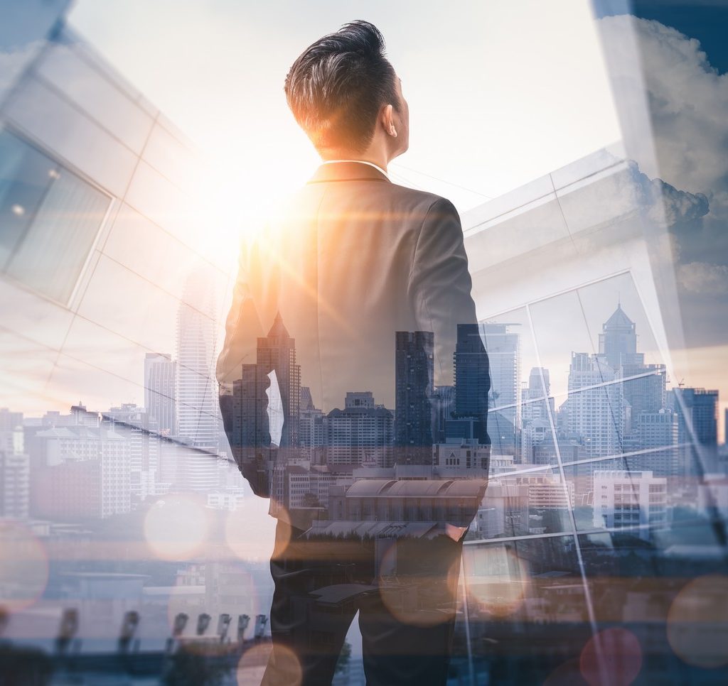 The,Double,Exposure,Image,Of,The,Business,Man,Standing,Back